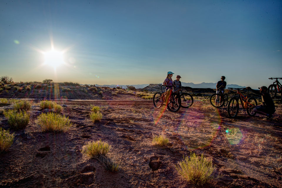 Instruction kneeling before Desert Sunrise ride