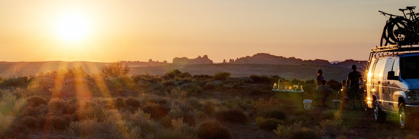 Desert Sunrise over Arches Nationa Park with breakfast and bikes
